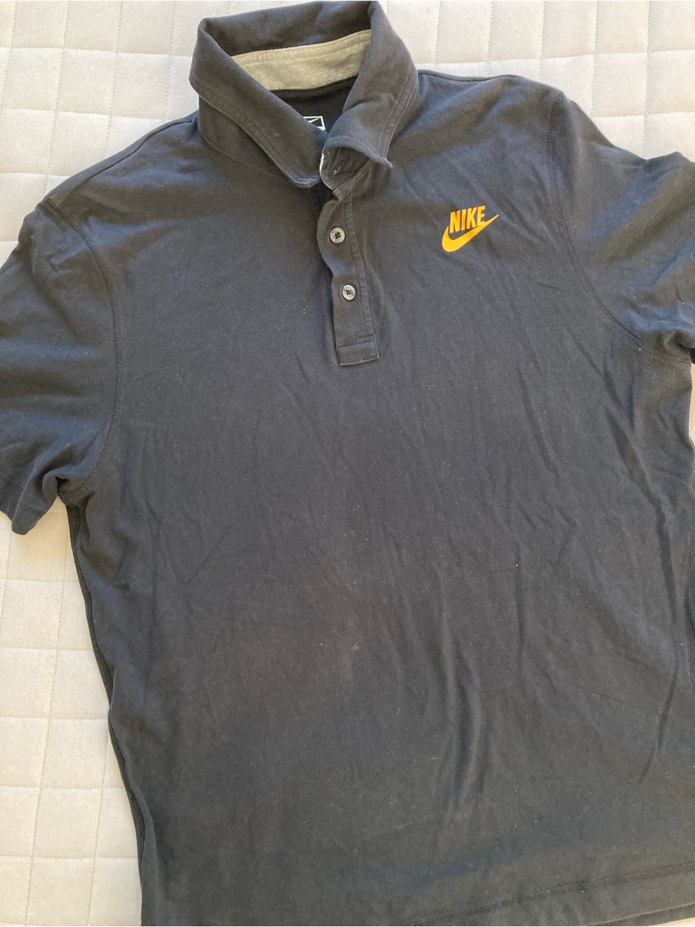 Nike Men’s Black Polo with Yellow Logo